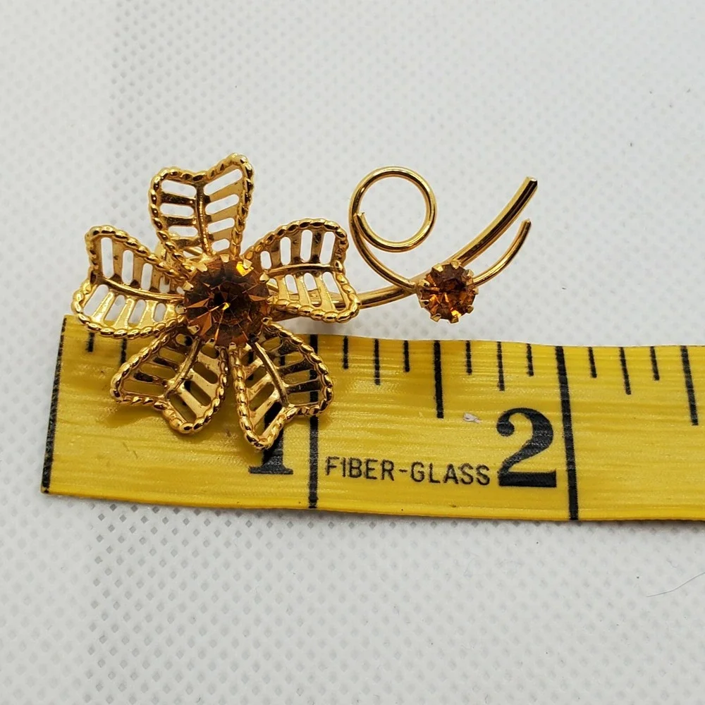 Vintage Open work Gold Tone Metal Flower w/Topaz color Rhinestones Brooch Pin